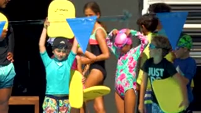 CABO SAN LUCAS MEXICO-2020: Young Children Preparing For A Swimming Lesson By