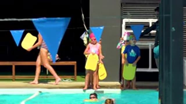 CABO SAN LUCAS MEXICO-2020: Girls And Boys Wearing Bathing Suits Swimming Caps