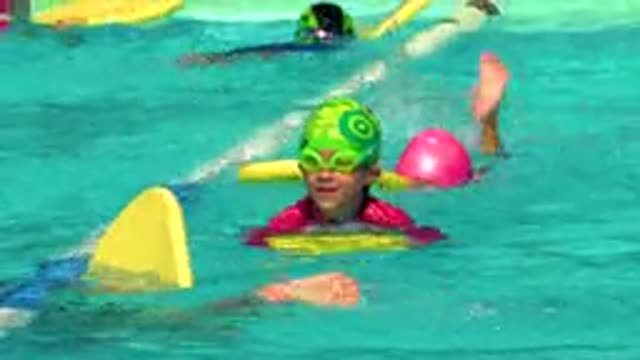 CABO SAN LUCAS MEXICO-2020: Two Smart Young Boys Swimming In The Clean Pool