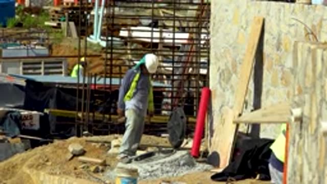 CABO SAN LUCAS MEXICO-2020: Young Construction Worker Wearing White Cap Doing