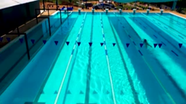 CABO SAN LUCAS MEXICO-2020: Athletic Swimmer Completing Laps in Olympic Pool