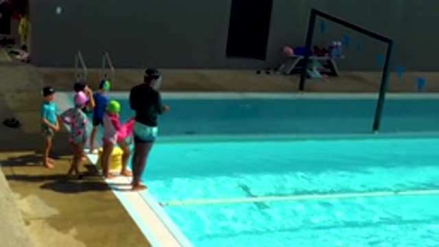 CABO SAN LUCAS MEXICO-2020: Children With A Coach At The Swimming Pool