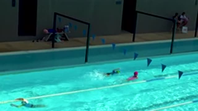 CABO SAN LUCAS MEXICO-2020: Kids Practicing Swimming Strokes With Adults