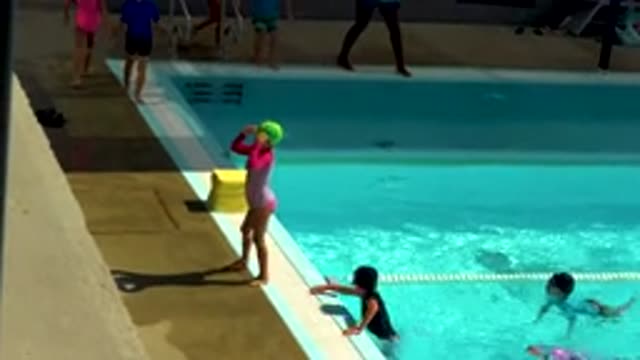 CABO SAN LUCAS MEXICO-2020: Kids Playing Joyfully in a Sunny Outdoor Setting