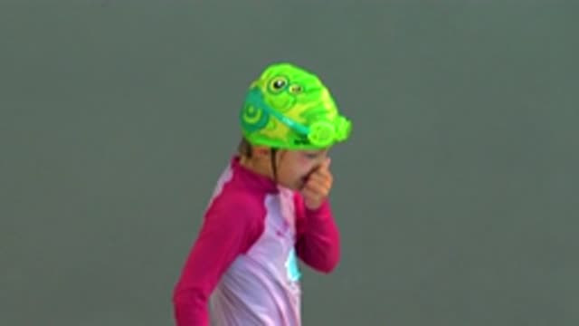 CABO SAN LUCAS MEXICO-2020: Cute Energetic Kids Having Fun Splashing Water At
