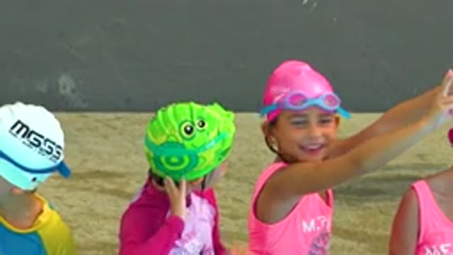 CABO SAN LUCAS MEXICO-2020: Girl Making Fun Of His Friend Making The Devil Sign