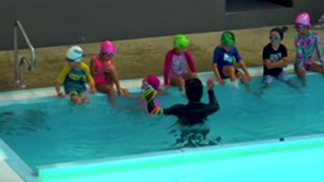 CABO SAN LUCAS MEXICO-2020: Children in Swimsuits at Pool During Swimming Lessons
