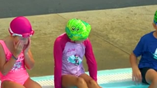 CABO SAN LUCAS MEXICO-2020: Five Children Playing Along The Edge Of A Swimming Pool