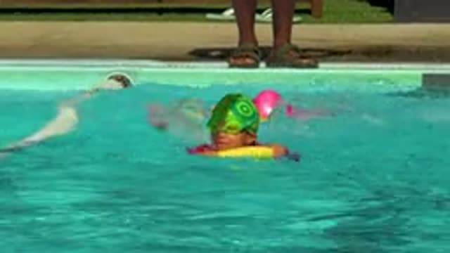 CABO SAN LUCAS MEXICO-2020: Two Smart Young Boys Swimming In The Clean Pool