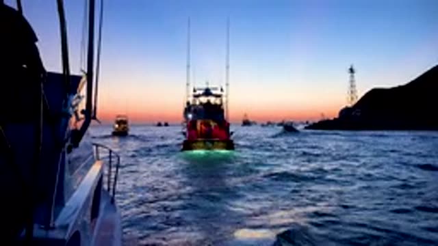 CABO SAN LUCAS MEXICO-2020: Take A Ride On A Boat With Neon Lights In The Ocean