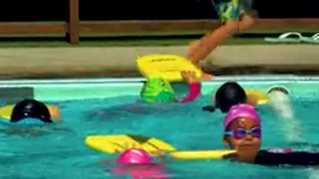 CABO SAN LUCAS MEXICO-2020: A Group Of Children Learning To Swim In A Pool