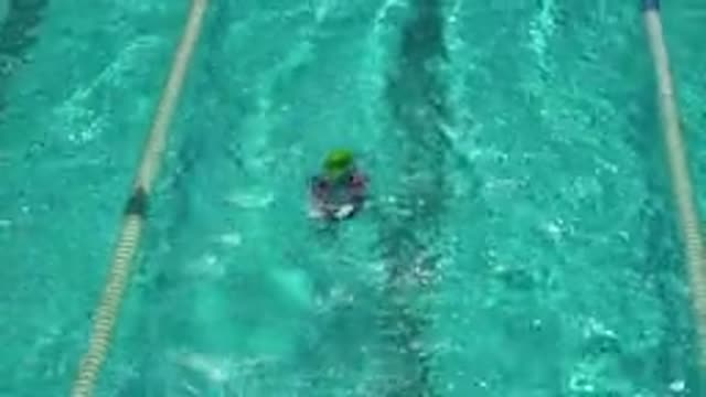 CABO SAN LUCAS MEXICO-2020: Children In Olympic Size Swimming Pool With Instructor