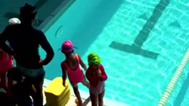 CABO SAN LUCAS MEXICO-2020: Kids Prepare To Swim In Swimming Pool