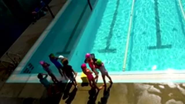 CABO SAN LUCAS MEXICO-2020: Camera Looking Down At A Group Of Small Kids Getting