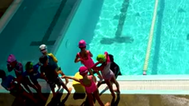 CABO SAN LUCAS MEXICO-2020: Kids And One Adult Are At A Swimming Pool In