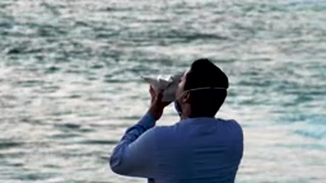 CABO SAN LUCAS MEXICO-2020: A Man By The Sea Enjoying A Unique Moment With