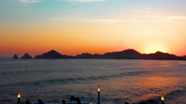 CABO SAN LUCAS MEXICO-2020: Waves Slowly Rolling Into The Shore Line With An