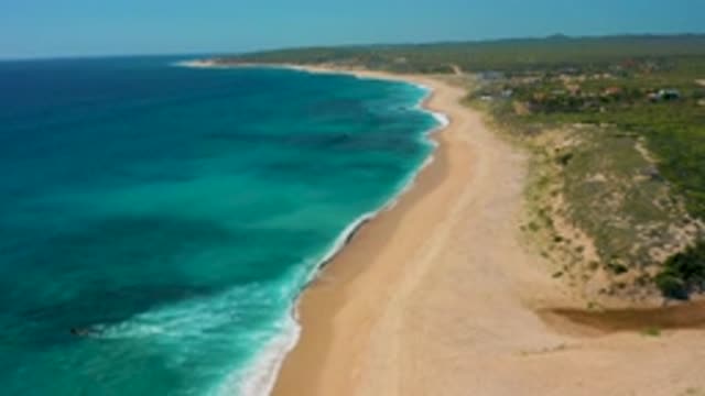 EL CARDONCITO BCS MEXICO-2020: Blue Sea Of Calm Waves With Low Vegetation