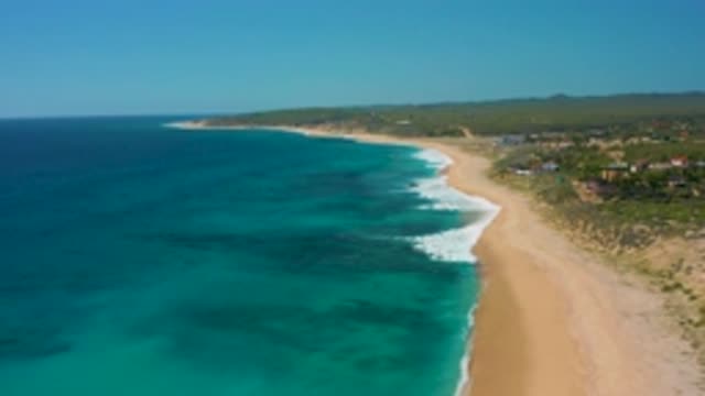 EL CARDONCITO BCS MEXICO-2020: Deep Blue Waves Wash Against Shore Creating Dark