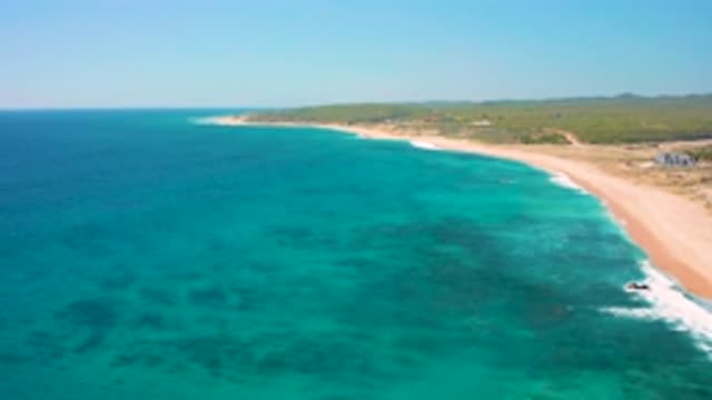EL CARDONCITO BCS MEXICO-2020: A Tranquil Shoreline With Ocean Waves And Sand