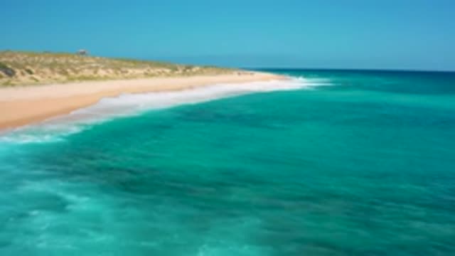 EL CARDONCITO BCS MEXICO-2020: Long Beach With Mild Waves Blue Sea Water With