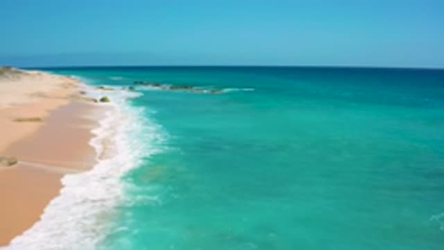 EL CARDONCITO BCS MEXICO-2020: Top View Of Water Flow Of A BeachSea With Waves