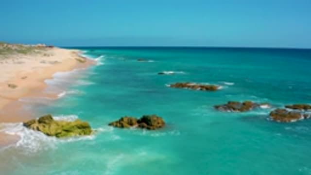 EL CARDONCITO BCS MEXICO-2020: Beach With Hills Vegetation Reefs And Water Waves