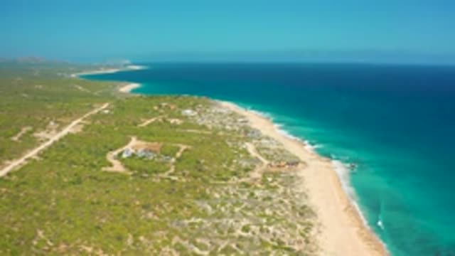 EL CARDONCITO BCS MEXICO-2020: Drone Footage Panning Ocean Tide and Beach