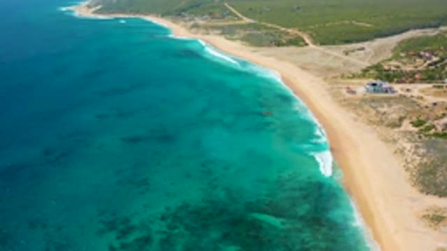 EL CARDONCITO BCS MEXICO-2020: Waves Gently Splashing Against the Sandy Shore