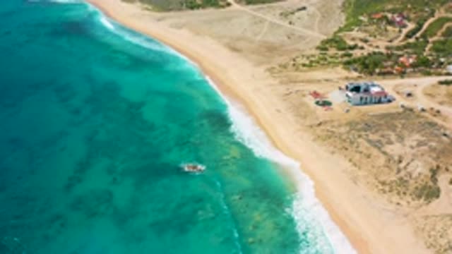EL CARDONCITO BCS MEXICO-2020: Aerial View Of A Shelter And A Boat In