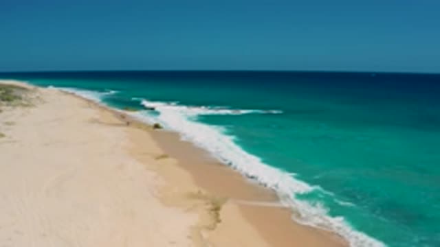 EL CARDONCITO BCS MEXICO-2020: Bird's-Eye View of Shoreline with Crashing Waves and White Sand