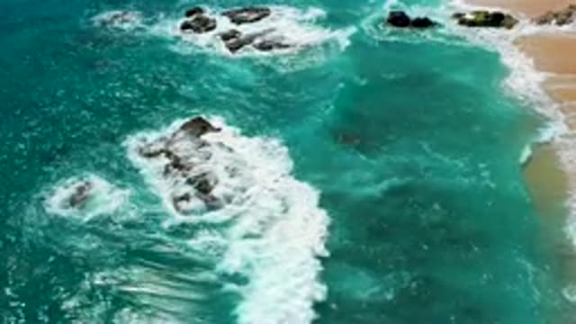 EL CARDONCITO BCS MEXICO-2020: Bright Green Ocean Waves Crash Into Rocks And