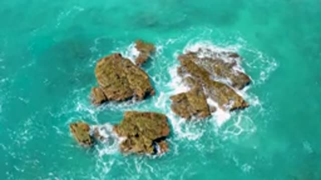 EL CARDONCITO BCS MEXICO-2020: Waves Lapping Over Rocks In The Ocean