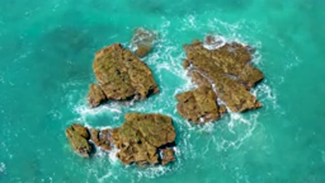 EL CARDONCITO BCS MEXICO-2020: Aerial View Of Waves Hitting The Rocks In The Sea