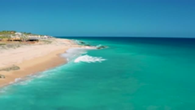 EL CARDONCITO BCS MEXICO-2020: Crystal Clear Surf Crashing On Sandy Beach With