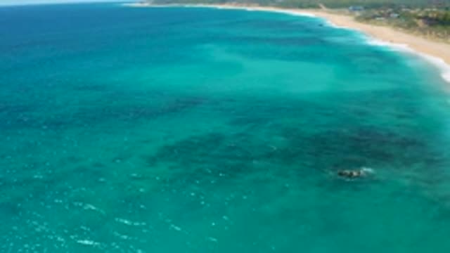 EL CARDONCITO BCS MEXICO-2020: Panning Over Blue Water With Dark Shadows Washing
