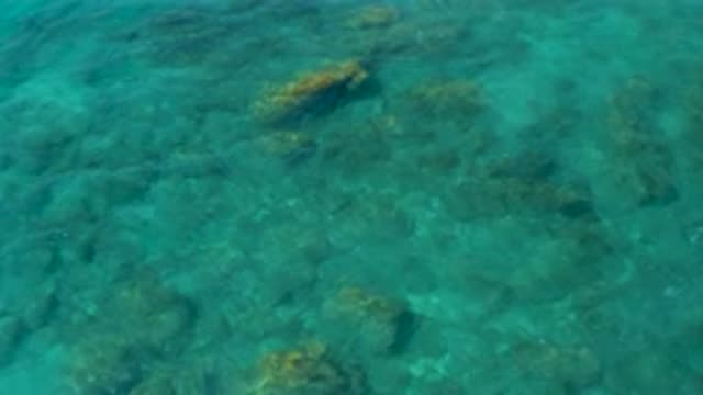 EL CARDONCITO BCS MEXICO-2020: Light Reflects On Clear Blue Water With Rocks