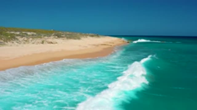 EL CARDONCITO BCS MEXICO-2020: Scenic Sight of Strong Blue Ocean Waves Hitting White Sands