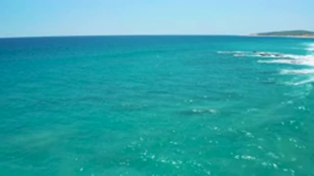 EL CARDONCITO BCS MEXICO-2020: Panning Over Rocky Shore Towards Open Blue Sea