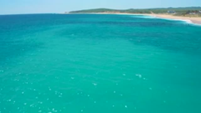 EL CARDONCITO BCS MEXICO-2020: Aerial View Of Blue Ocean Waves Crashing On The