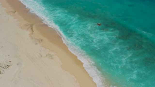 EL CARDONCITO BCS MEXICO-2020: Object in Water Being Knocked by Rough Waves