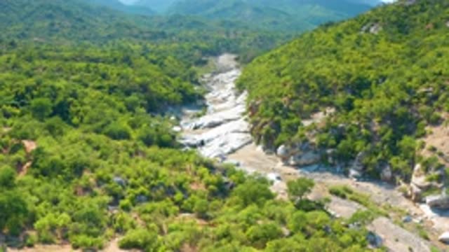 LA PALMA BCS MEXICO-2020: Empty River Bed Filled With Rocks And Surrounded By A