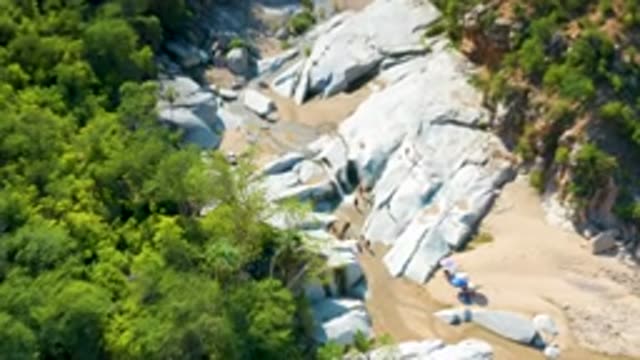 LA PALMA BCS MEXICO-2020: Top View Of Beautiful White Rocks Beside Greenery