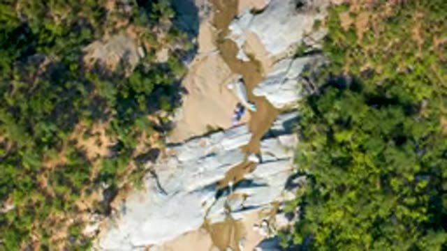 LA PALMA BCS MEXICO-2020: Spinning Drone Footage of Dry Riverbed Rocky Sandy