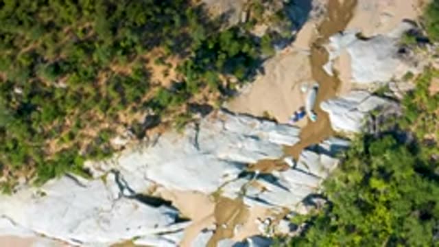 LA PALMA BCS MEXICO-2020: Sky View Of Land Trees Rocks And Sand