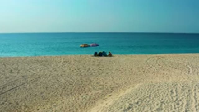 DESERT PARK NATURAL RESERVE BAJA CALIFORNIA SUR MEXICO-2020: Aerial View of People Sitting on Sandy Beach