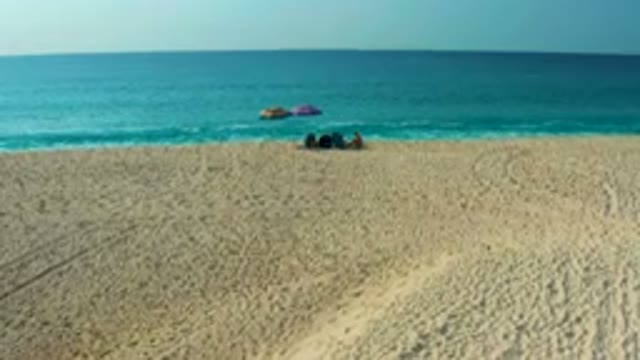 DESERT PARK NATURAL RESERVE BAJA CALIFORNIA SUR MEXICO-2020: Aerial View Of People Relaxing On Sandy Beach