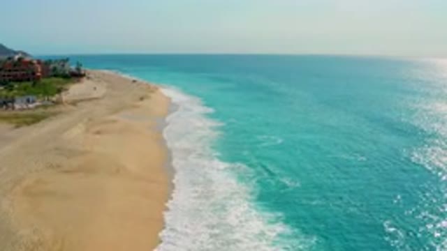 DESERT PARK NATURAL RESERVE BAJA CALIFORNIA SUR MEXICO-2020: Aerial View Of Turquoise Ocean Waves Washing Shore