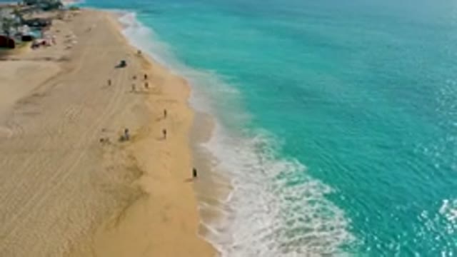 DESERT PARK NATURAL RESERVE BAJA CALIFORNIA SUR MEXICO-2020: Aerial View Of People Walking On Sandy Beach
