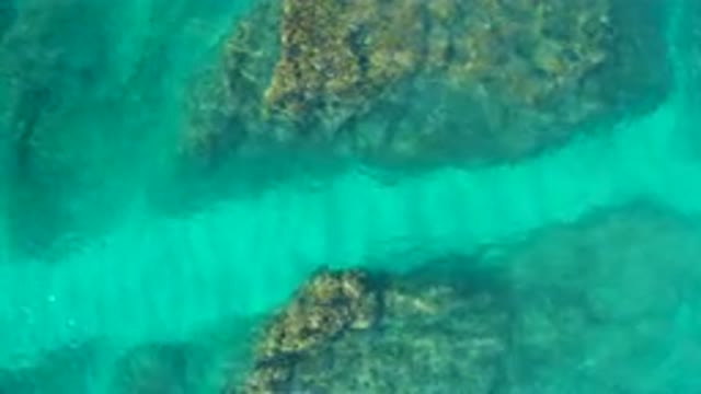 DESERT PARK NATURAL RESERVE BAJA CALIFORNIA SUR MEXICO-2020: Aerial View Of Turquoise Water Between Rocks